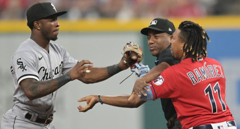 Tim Anderson and José Ramírez square up to fight.